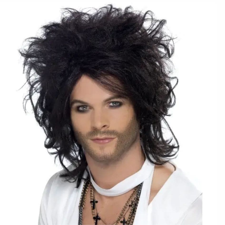 Sex God Wig from Joke.ie Step into a realm of irresistible allure with our Sex God Wig, a bold and daring accessory designed to elevate your style and confidence. This striking wig captures the essence of unapologetic charisma and timeless seduction, perfect for those who dare to stand out. Features: Dynamic Design: Crafted to emulate a voluminous, tousled look, this wig exudes an effortless, edgy charm that turns heads wherever you go. Premium Texture: Made from top-quality synthetic fibers that mimic the look and feel of natural hair, providing a touchably soft and luxurious experience. Effortless Fit: The adjustable cap ensures a secure and comfortable fit for various head sizes. Whether you're hitting the dance floor or attending a glamorous event, this wig stays perfectly in place. Versatile Appeal: Perfect for costume parties, cosplay, or simply adding a touch of daring flair to your everyday ensemble. Pair it with bold accessories and confident attire to complete the look. Low Maintenance: Designed for ease of care, this wig retains its shape and style with minimal upkeep, allowing you to focus on showcasing your captivating presence. Transform yourself into the epitome of allure with the Sex God Wig. It’s not just a wig; it’s an invitation to embrace your most confident self and make a lasting impression. Every day becomes an opportunity to captivate and conquer with this stunning accessory. Perfect for All Occasions: Whether you're attending a themed party, performing on stage, or just looking to spice up your daily look, this wig adds a touch of sophistication and daring. Channel your inner rock star or silver screen icon and let your hair make a statement. With the Sex God Wig, every moment becomes a showcase of bold and irresistible charm. Furthermore, this wig is constructed for durability, ensuring that you can enjoy its stunning style for many events to come. Additionally, the high-quality materials used in its creation mean that it will maintain its vibrant look and feel even after multiple uses. In summary, the Sex God Wig is the ultimate blend of style, comfort, and magnetism, making it a must-have addition to your collection. We recommend the use of a Wig Cap  with all eighties wigs for extra comfort.