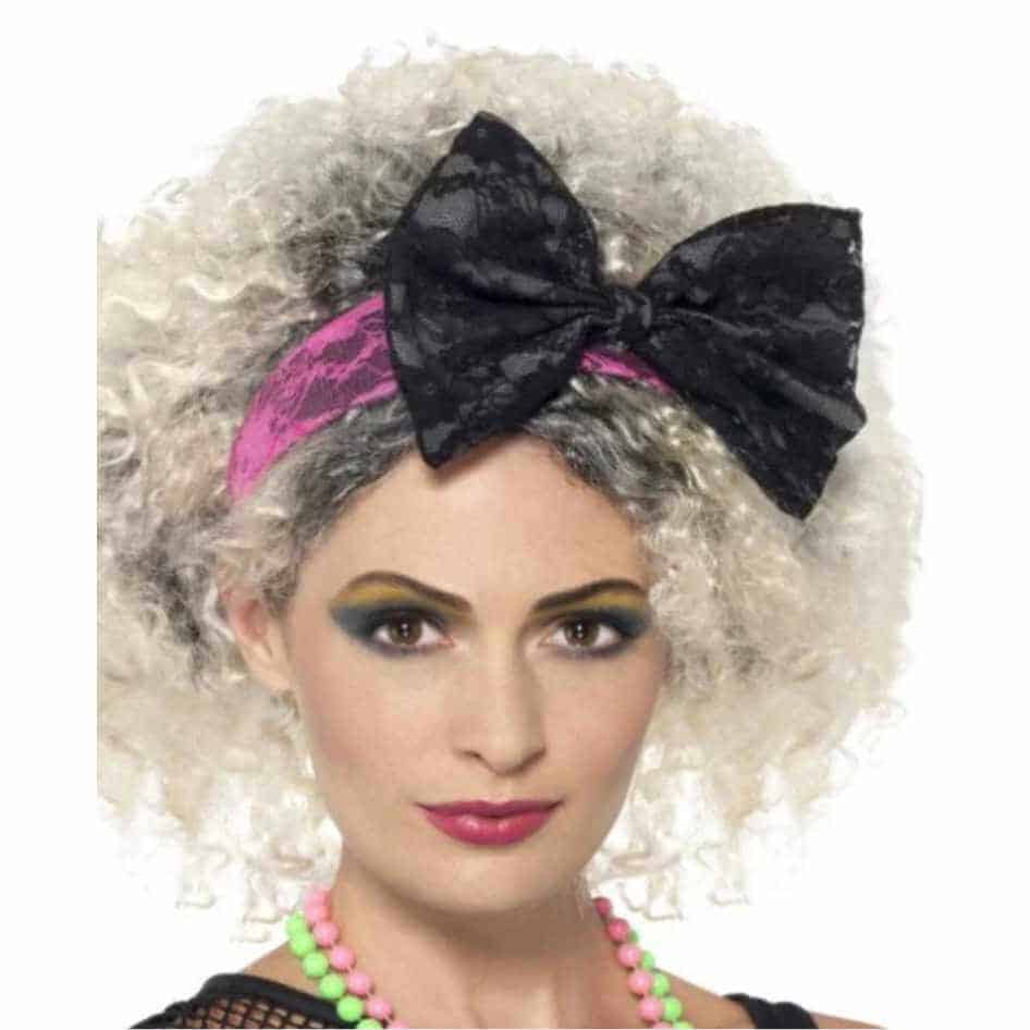 80's Pink Lace Headband Hot pink 80's Lace Headband with black bow.This is ideal for all your eighties fancy dress costumes.