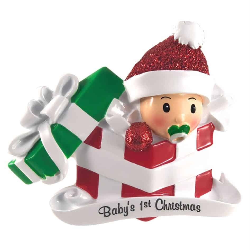 Baby First Christmas Decoration from joke.ie Our very popular Baby First Christmas Decoration is the ideal Christmas gift to hang on the Christmas tree, and when the festive season is over pop it into the keepsake box. This cute decoration is in traditional red and green Christmas colours. Personalise it with your new baby's name in the relevant field. These quality hand painted decorations are made from polyresin material and finished to a high standard with a high gloss finish.none. Your gift will be wrapped it tissue and finished in a luxury gift bag. A perfect gift for a new baby.
