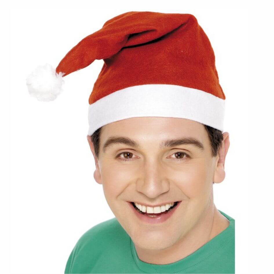 Santa Hat Ho Ho Ho,Our popular Santa Hat is the go to every year. A simple no fuss bargain fleece Santa hat in red with white trim on the edging.Get that festive feeling. Add cheerful holiday charm to your festive celebrations with our Budget Christmas Santa Hat, the perfect low-cost accessory for anyone looking to spread seasonal joy without overspending. Designed in classic red and white, this Christmas hat captures the traditional look everyone loves, making it ideal for parties, school events, office gatherings, family photos, or everyday holiday fun. Whether you’re decorating the tree, attending a festive event, or handing out gifts, this hat brings instant Christmas spirit to any outfit. Crafted from soft, lightweight fabric, the hat offers comfortable all-day wear and stays cozy even during chilly winter activities. The bright red body contrasts beautifully with the plush white trim, creating a timeless festive style. To complete its classic holiday look, the hat is finished off with a Christmas bobble, adding a playful touch that gently bounces as you move. It’s a simple detail that makes the hat feel extra merry and magical. This Christmas accessory comes in one size, designed to fit most adults and older children with ease. The flexible material provides a snug yet comfortable fit, making it a great choice for groups, teams, performers, or event hosts who need matching holiday hats on a budget. Affordable, festive, and fun, the Budget Christmas Hat is the perfect seasonal essential for anyone wanting to add a joyful finishing touch to their Christmas look. Spread holiday cheer the easy way—just pop it on and let the magic begin! Great for carol singing and the office party!