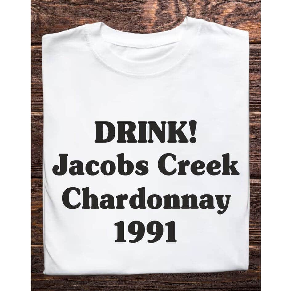 Father Ted Inspired: 1991 Jacobs Creek Chardonnay Tee Shirt from Joke.ie, Ireland. Celebrate your love for classic comedy with our Father Ted inspired "1991 Jacobs Creek Chardonnay" tee shirt. Perfect for fans of the beloved television series, this unique tee captures the quirky humor and memorable moments that made Father Ted a timeless favorite. Whether you're heading to a comedy convention, relaxing at home, or hanging out with friends, this tee is a must-have addition to your wardrobe. Embrace the Quirkiness Nostalgic Design: The tee shirt features a playful design that pays homage to one of the most iconic and hilarious moments from Father Ted. The bold text and simple graphic are printed on high-quality fabric, ensuring that the humor and charm of the show are captured in every detail. This tee shirt is not just a piece of clothing; it's a conversation starter and a tribute to classic television comedy. High-Quality Materials Comfort and Durability: Made from a soft and breathable cotton blend, the "1991 Jacobs Creek Chardonnay" tee shirt offers superior comfort for all-day wear. The durable fabric is designed to withstand repeated washing and wearing, ensuring that this tee remains a staple in your collection for years to come. The lightweight material makes it perfect for layering or wearing on its own, providing versatility for any season. Perfect Fit Unisex Sizing: Available in a range of unisex sizes, the "1991 Jacobs Creek Chardonnay" tee shirt is designed to fit comfortably on both men and women. The classic crew neck and relaxed fit ensure that you look stylish while feeling comfortable. Transition seamlessly from casual outings to relaxed evenings at home with this versatile tee. Ideal for Various Occasions Versatile Style: Whether you're binge-watching Father Ted, attending a themed party, or just enjoying a casual day out, this tee shirt is the perfect choice. Its simple yet eye-catching design makes it suitable for a variety of occasions, allowing you to showcase your love for the show wherever you go. Great Gift Idea: Looking for a unique gift for a Father Ted fan? The "1991 Jacobs Creek Chardonnay" tee shirt is an excellent choice. Its nostalgic design and high-quality construction make it a thoughtful and memorable gift for birthdays, holidays, or just because. Easy Care Low Maintenance: The "1991 Jacobs Creek Chardonnay" tee shirt is easy to care for, requiring minimal effort to keep it looking its best. Simply machine wash in cold water and tumble dry on low heat to maintain the vibrant print and comfortable fabric. This Father Ted inspired tee shirt is a must-have for fans of the show. Its nostalgic design, high-quality materials, and versatile style make it the perfect addition to any wardrobe. Celebrate Your Love for Classic Comedy with this unique and stylish tee shirt, and bring a touch of Father Ted humor to your everyday life. Colour: White loose fit tee Size: Small 35/37″ Medium 38/40″ Large 41/43″ X Large 44/46″ 2X Large 47/49″ 3X Large 50/522 View our entire Father Ted Collection here.