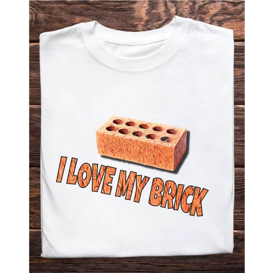 Father Ted Inspired: I Love My Brick Tee Shirt from Joke.ie, Ireland. Celebrate your love for classic comedy with our Father Ted inspired "I Love My Brick" tee shirt. Perfect for fans of the beloved television series, this unique tee captures the quirky humor and memorable moments that made Father Ted a timeless favorite. Whether you're heading to a comedy convention, relaxing at home, or hanging out with friends, this tee is a must-have addition to your wardrobe. Embrace the Quirkiness Nostalgic Design: The "I Love My Brick" tee shirt features a playful design that pays homage to one of the most iconic and hilarious episodes of Father Ted. The bold text and simple graphic are printed on a high-quality fabric, ensuring that the humor and charm of the show are captured in every detail. This tee shirt is not just a piece of clothing; it's a conversation starter and a tribute to classic television comedy. High-Quality Materials Comfort and Durability: Made from a soft and breathable cotton blend, the "I Love My Brick" tee shirt offers superior comfort for all-day wear. The durable fabric is designed to withstand repeated washing and wearing, ensuring that this tee remains a staple in your collection for years to come. The lightweight material makes it perfect for layering or wearing on its own, providing versatility for any season. Perfect Fit Unisex Sizing: Available in a range of unisex sizes, the "I Love My Brick" tee shirt is designed to fit comfortably on both men and women. The classic crew neck and relaxed fit ensure that you look stylish while feeling comfortable. Transition seamlessly from casual outings to relaxed evenings at home with this versatile tee. Ideal for Various Occasions Versatile Style: Whether you're binge-watching Father Ted, attending a themed party, or just enjoying a casual day out, this tee shirt is the perfect choice. Its simple yet eye-catching design makes it suitable for a variety of occasions, allowing you to showcase your love for the show wherever you go. Great Gift Idea: Looking for a unique gift for a Father Ted fan? The "I Love My Brick" tee shirt is an excellent choice. Its nostalgic design and high-quality construction make it a thoughtful and memorable gift for birthdays, holidays, or just because. Easy Care Low Maintenance: The "I Love My Brick" tee shirt is easy to care for, requiring minimal effort to keep it looking its best. Simply machine wash in cold water and tumble dry on low heat to maintain the vibrant print and comfortable fabric. The Father Ted inspired "I Love My Brick" tee shirt is a must-have for fans of the show. Its nostalgic design, high-quality materials, and versatile style make it the perfect addition to any wardrobe. Celebrate Your Love for Classic Comedy with this unique and stylish tee shirt, and bring a touch of Father Ted humor to your everyday life. Colour: White loose fit tee Size: Small 35/37″ Medium 38/40″ Large 41/43″ X Large 44/46″ 2X Large 47/49″ 3X Large 50/522 View our entire Father Ted Collection here.