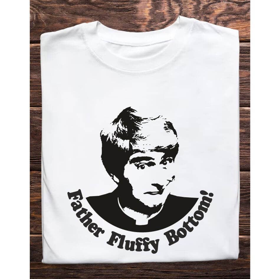Father Ted Themed "Father Fluffy Bottom" Tee Shirt from Joke.ie, Ireland. Immerse yourself in the whimsical humor of Father Ted with our "Father Fluffy Bottom" Tee Shirt. Perfect for fans who adore the series' quirky charm and unforgettable characters, this tee captures a humorous and iconic moment from the show. Design and Style The "Father Fluffy Bottom" Tee Shirt features a charming portrait of Father Ted, beautifully capturing his mischievous expression. Below the image, the phrase "Father Fluffy Bottom" is printed in a playful, elegant font. This design is a tribute to one of the series' funniest and most endearing moments, making it an instant favorite for any fan. Material and Comfort Crafted from cotton, this tee shirt offers superior comfort and durability. The soft, breathable fabric ensures a cozy fit, perfect for everyday wear or special occasions. The tee maintains its shape and size even after multiple washes, providing long-lasting enjoyment. Humorous and Nostalgic Wearing the "Father Fluffy Bottom" Tee Shirt is a delightful way to celebrate the unique humor of Father Ted. The design evokes laughter and fond memories of the show's classic moments, particularly the hilarious instance where Father Ted is humorously nicknamed "Father Fluffy Bottom." It's a subtle yet effective way to showcase your love for the series and connect with fellow fans. Versatile and Stylish This tee shirt pairs well with jeans, shorts, or even pajama bottoms for a relaxed, casual look. Its classic fit makes it suitable for any occasion, whether you’re heading to a comedy night, hanging out with friends, or simply relaxing at home. The humorous design ensures you'll stand out and spark conversations wherever you go. Perfect Gift for Fans Looking for the perfect gift for a Father Ted aficionado? The "Father Fluffy Bottom" Tee Shirt is an excellent choice. Its unique design and high-quality construction make it a thoughtful and enjoyable present for birthdays, holidays, or any special occasion. Featuring the iconic portrait and humorous nickname of Father Ted, this shirt is a must-have for any fan of the show. Enjoy the comfort of premium cotton and the joy of sharing your favorite TV moments with the world. Get your "Father Fluffy Bottom" Tee Shirt today and add a touch of Craggy Island humor to your wardrobe! Colour: White loose fit tee Size: Small 35/37″ Medium 38/40″ Large 41/43″ X Large 44/46″ 2X Large 47/49″ 3X Large 50/522 View our entire Father Ted Collection here.