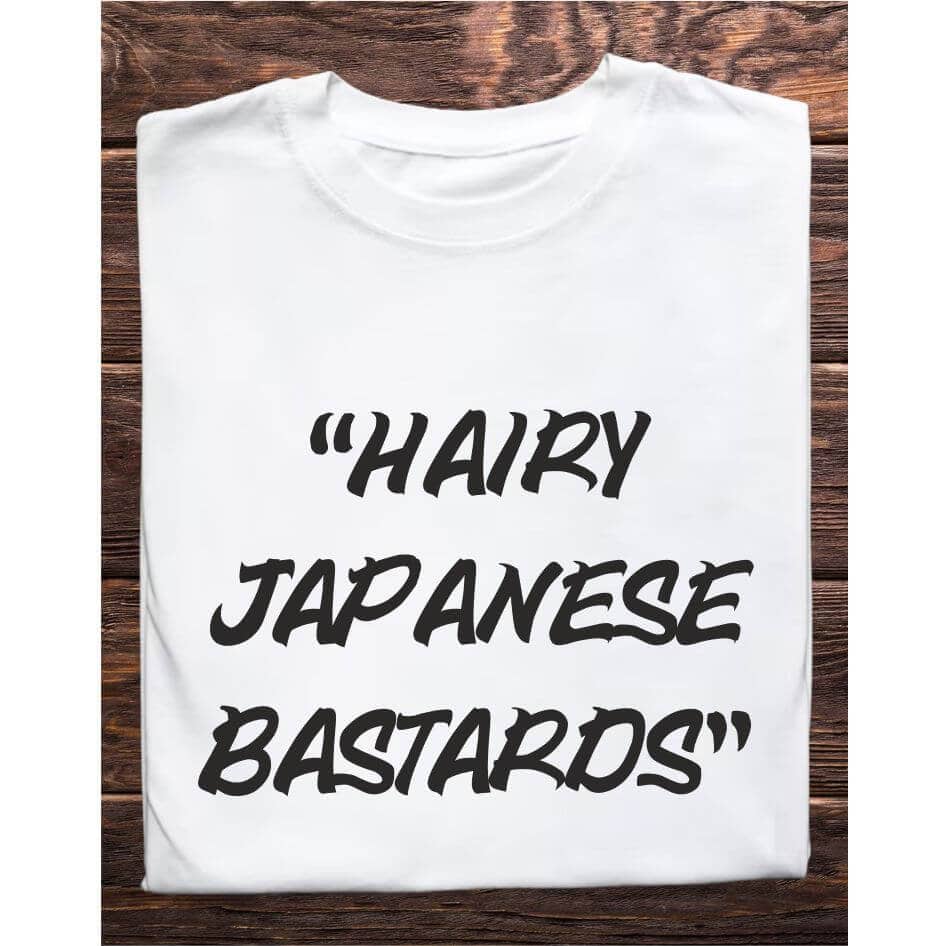Father Ted Inspired: Hairy Japanese Tee Shirt from Joke.ie, Ireland. Celebrate your love for classic comedy with our Father Ted inspired Hairy Japanese tee shirt. Perfect for fans of the beloved television series, this unique tee captures the quirky humor and memorable moments that made Father Ted a timeless favorite. Whether you're heading to a comedy convention, relaxing at home, or hanging out with friends, this tee is a must-have addition to your wardrobe. Embrace the Quirkiness Nostalgic Design: The Hairy Japanese tee shirt features a playful design that pays homage to one of the most iconic and hilarious moments from Father Ted. The text, "Hairy Japanese Bastards," is prominently displayed, capturing the humor and charm of the show. This tee shirt is not just a piece of clothing; it's a conversation starter and a tribute to classic television comedy. High-Quality Materials Comfort and Durability: Made from a soft and breathable cotton blend, the tee shirt offers superior comfort for all-day wear. The durable fabric is designed to withstand repeated washing and wearing, ensuring that this tee remains a staple in your collection for years to come. The lightweight material makes it perfect for layering or wearing on its own, providing versatility for any season. Perfect Fit Unisex Sizing: Available in a range of unisex sizes, the Hairy Japanese tee shirt is designed to fit comfortably on both men and women. The classic crew neck and relaxed fit ensure that you look stylish while feeling comfortable. Transition seamlessly from casual outings to relaxed evenings at home with this versatile tee. Ideal for Various Occasions Versatile Style: Whether you're binge-watching Father Ted, attending a themed party, or just enjoying a casual day out, this tee shirt is the perfect choice. Its simple yet eye-catching design makes it suitable for a variety of occasions, allowing you to showcase your love for the show wherever you go. Great Gift Idea: Looking for a unique gift for a Father Ted fan? The Hairy Japanese Tee Shirt is an excellent choice. Its nostalgic design and high-quality construction make it a thoughtful and memorable gift for birthdays, holidays, or just because. Easy Care Low Maintenance: The tee is easy to care for, requiring minimal effort to keep it looking its best. Simply machine wash in cold water and tumble dry on low heat to maintain the vibrant print and comfortable fabric. This Father Ted inspired tee shirt is a must-have for fans of the show. Its nostalgic design, high-quality materials, and versatile style make it the perfect addition to any wardrobe. Celebrate Your Love for Classic Comedy with this unique and stylish tee shirt, and bring a touch of Father Ted humor to your everyday life. Colour: White loose fit tee Size: Small 35/37″ Medium 38/40″ Large 41/43″ X Large 44/46″ 2X Large 47/49″ 3X Large 50/522 View our entire Father Ted Collection here.