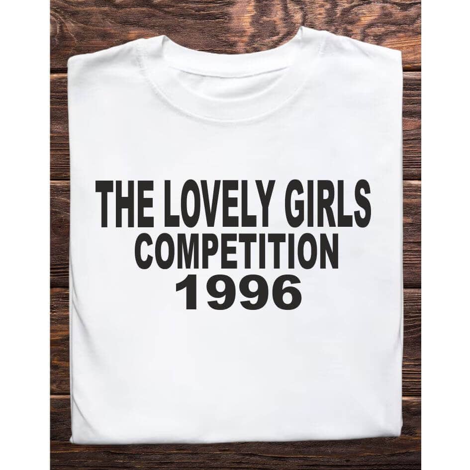Father Ted Inspired: Lovely Girls Tee Shirt from Joke.ie, Ireland. Celebrate your love for classic comedy with our Father Ted inspired Lovely Girls tee shirt. Perfect for fans of the beloved television series, this unique tee captures the quirky humor and memorable moments that made Father Ted a timeless favorite. Whether you're heading to a comedy convention, relaxing at home, or hanging out with friends, this tee is a must-have addition to your wardrobe. Embrace the Quirkiness Nostalgic Design: The Lovely Girls tee shirt features a playful design that pays homage to one of the most iconic and hilarious moments from Father Ted. The bold text, "Lovely Girls Competition 1996," is printed on high-quality fabric, ensuring that the humor and charm of the show are captured in every detail. This tee shirt is not just a piece of clothing; it's a conversation starter and a tribute to classic television comedy. High-Quality Materials Comfort and Durability: Made from a soft and breathable cotton blend, the Lovely Girls tee shirt offers superior comfort for all-day wear. The durable fabric is designed to withstand repeated washing and wearing, ensuring that this tee remains a staple in your collection for years to come. The lightweight material makes it perfect for layering or wearing on its own, providing versatility for any season. Perfect Fit Unisex Sizing: Available in a range of unisex sizes, the Lovely Girls tee shirt is designed to fit comfortably on both men and women. The classic crew neck and relaxed fit ensure that you look stylish while feeling comfortable. Transition seamlessly from casual outings to relaxed evenings at home with this versatile tee. Ideal for Various Occasions Versatile Style: Whether you're binge-watching Father Ted, attending a themed party, or just enjoying a casual day out, this tee shirt is the perfect choice. Its simple yet eye-catching design makes it suitable for a variety of occasions, allowing you to showcase your love for the show wherever you go. Great Gift Idea: Looking for a unique gift for a Father Ted fan? The Lovely Girls tee shirt is an excellent choice. Its nostalgic design and high-quality construction make it a thoughtful and memorable gift for birthdays, holidays, or just because. Easy Care Low Maintenance: The "Lovely Girls" tee shirt is easy to care for, requiring minimal effort to keep it looking its best. Simply machine wash in cold water and tumble dry on low heat to maintain the vibrant print and comfortable fabric. The Father Ted inspired  tee shirt is a must-have for fans of the show. Its nostalgic design, high-quality materials, and versatile style make it the perfect addition to any wardrobe. Celebrate Your Love for Classic Comedy with this unique and stylish tee shirt, and bring a touch of Father Ted humor to your everyday life. Colour: White loose fit tee Size: Small 35/37″ Medium 38/40″ Large 41/43″ X Large 44/46″ 2X Large 47/49″ 3X Large 50/522 View our entire Father Ted Collection here.