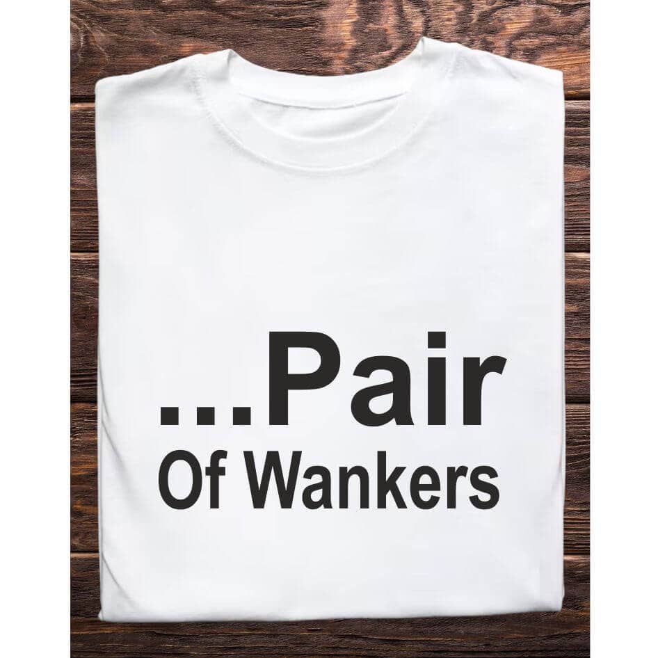 Father Ted Inspired: Wankers Tee Shirt from Joke.ie, Ireland. Celebrate your love for classic comedy with our Father Ted inspired "Wankers" tee shirt. Perfect for fans of the beloved television series, this unique tee captures the quirky humor and memorable moments that made Father Ted a timeless favorite. Whether you're heading to a comedy convention, relaxing at home, or hanging out with friends, this tee is a must-have addition to your wardrobe. Embrace the Quirkiness Nostalgic Design: The "Wankers" tee shirt features a playful design that pays homage to one of the most iconic and hilarious moments from Father Ted. The bold text, "...Pair of Wankers," is printed on high-quality fabric, ensuring that the humor and charm of the show are captured in every detail. This tee shirt is not just a piece of clothing; it's a conversation starter and a tribute to classic television comedy. High-Quality Materials Comfort and Durability: Made from a soft and breathable cotton blend, the "Wankers" tee shirt offers superior comfort for all-day wear. The durable fabric is designed to withstand repeated washing and wearing, ensuring that this tee remains a staple in your collection for years to come. The lightweight material makes it perfect for layering or wearing on its own, providing versatility for any season. Perfect Fit Unisex Sizing: Available in a range of unisex sizes, the "Wankers" tee shirt is designed to fit comfortably on both men and women. The classic crew neck and relaxed fit ensure that you look stylish while feeling comfortable. Transition seamlessly from casual outings to relaxed evenings at home with this versatile tee. Ideal for Various Occasions Versatile Style: Whether you're binge-watching Father Ted, attending a themed party, or just enjoying a casual day out, this tee shirt is the perfect choice. Its simple yet eye-catching design makes it suitable for a variety of occasions, allowing you to showcase your love for the show wherever you go. Great Gift Idea: Looking for a unique gift for a Father Ted fan? The "Wankers" tee shirt is an excellent choice. Its nostalgic design and high-quality construction make it a thoughtful and memorable gift for birthdays, holidays, or just because. Easy Care Low Maintenance: The "Wankers" tee shirt is easy to care for, requiring minimal effort to keep it looking its best. Simply machine wash in cold water and tumble dry on low heat to maintain the vibrant print and comfortable fabric. This Father Ted inspired tee shirt is a must-have for fans of the show. Its nostalgic design, high-quality materials, and versatile style make it the perfect addition to any wardrobe. Celebrate Your Love for Classic Comedy with this unique and stylish tee shirt, and bring a touch of Father Ted humor to your everyday life. Colour: White loose fit tee Size: Small 35/37″ Medium 38/40″ Large 41/43″ X Large 44/46″ 2X Large 47/49″ 3X Large 50/522 View our entire Father Ted Collection here.