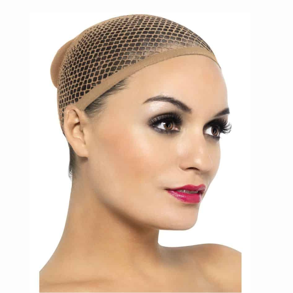 Mesh Wig Cap (Nude Colour) from joke.ie Ireland Looking for a comfortable and secure base for your wig? Our Mesh Wig Cap in Nude Colour is the perfect solution for all-day wear and natural blending. Designed with lightweight, breathable mesh material, this cap keeps your scalp cool while providing a snug fit that keeps your wig in place without slipping. The nude tone ensures a seamless, invisible look under any wig—especially ideal for lace front and natural part styles. This wig cap is stretchable and fits most head sizes, making it suitable for beginners and professionals alike. Whether you're wearing synthetic or human hair wigs, this cap offers the comfort and stability you need. The mesh design allows for proper airflow, preventing heat buildup and helping to maintain scalp health. Ideal for cosplay, daily wear, or special occasions, this nude mesh wig cap gives you the foundation to style confidently. Easy to wash and reuse, it’s a must-have accessory for every wig wearer. Upgrade your wig routine with a cap that combines functionality, comfort, and a natural look. Shop the Mesh Wig Cap today and enjoy a flawless finish every time! If you are using a wig for longer periods of time, the Wig Cap is recommended.