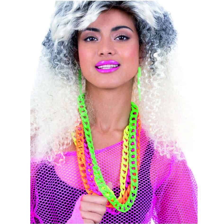 Turn back time with this bold and colorful 80s Chain Necklace Set from joke.ie– the ultimate retro accessory for any throwback look! This eye-catching statement necklace features 4 chunky chains in iconic neon colors: pink, yellow, green, and orange. Perfectly layered for instant impact, it captures the fearless fashion spirit of the 1980s. Whether you're dressing up for an 80s fancy dress party, heading to a music festival, or adding a pop of fun to your everyday outfit, this necklace delivers style, attitude, and nostalgic flair. Made from lightweight yet durable plastic, each neon chain is comfortable to wear and built to last through any party or performance. The layered design makes it easy to wear as a complete set—no need to mix and match. Just throw it on and go full neon! Ideal for costume parties, themed events, raves, or retro photo shoots, this versatile piece is suitable for both teens and adults looking to relive or reimagine the neon decade. Stand out, glow bright, and channel the energy of the 1980s with this vibrant 4-chain necklace—a must-have for any vintage fashion lover.